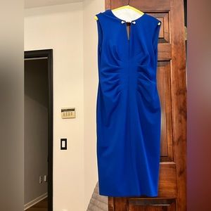 Blue dress with gold and pearl accent